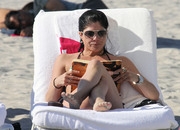 8a6ad Selma Blair on the beach in a bikini. Miami, Florida (Mar 9, 2009) x5 Get more nipple slips at Nipple Slips org